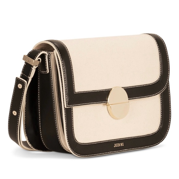 Jason Wu
Orbit Canvas / Leather Shoulder Bag NWT Color Beige/ Black - Picture 4 of 14